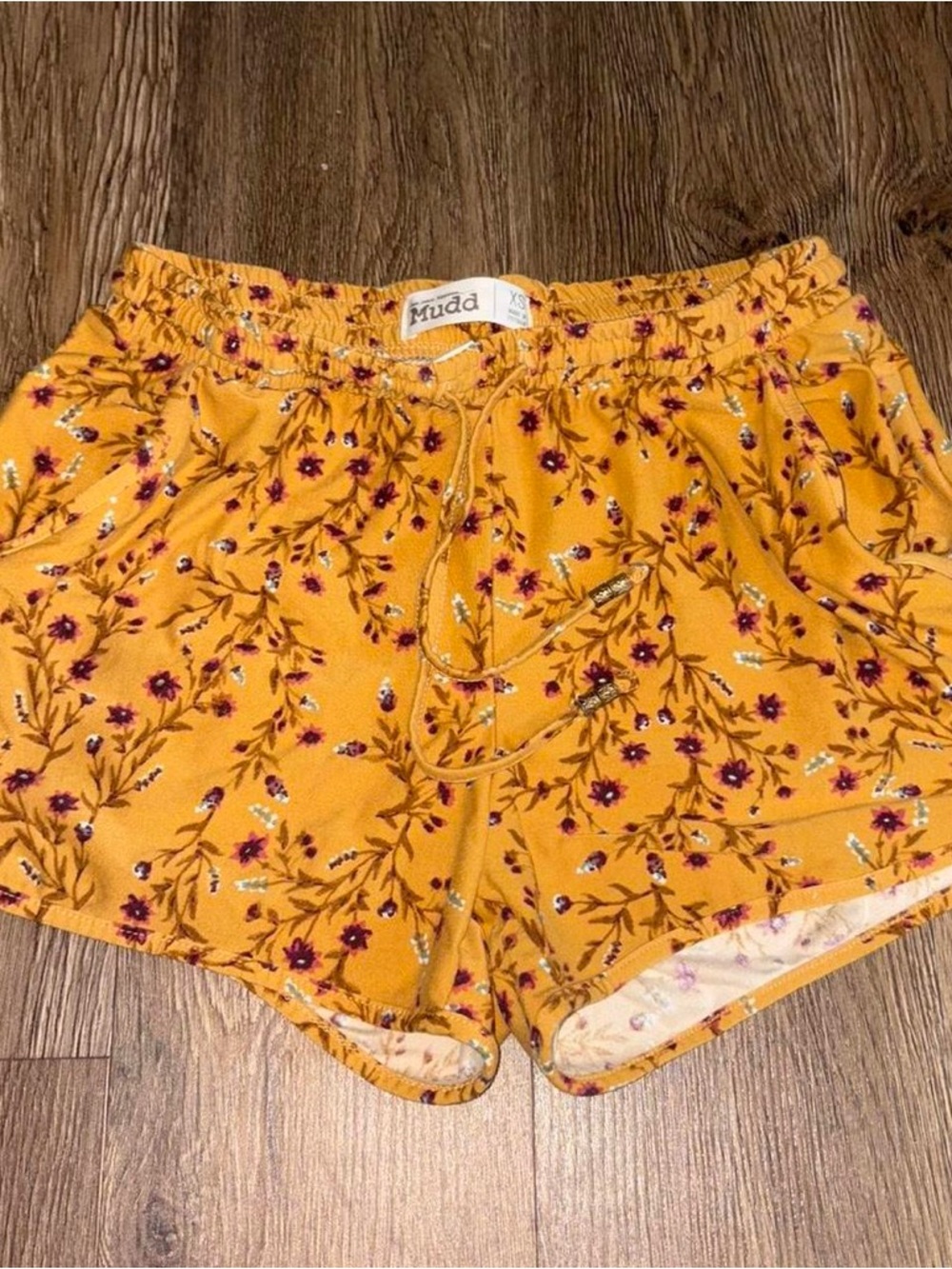 Yellow floral shorts with drawstring waist